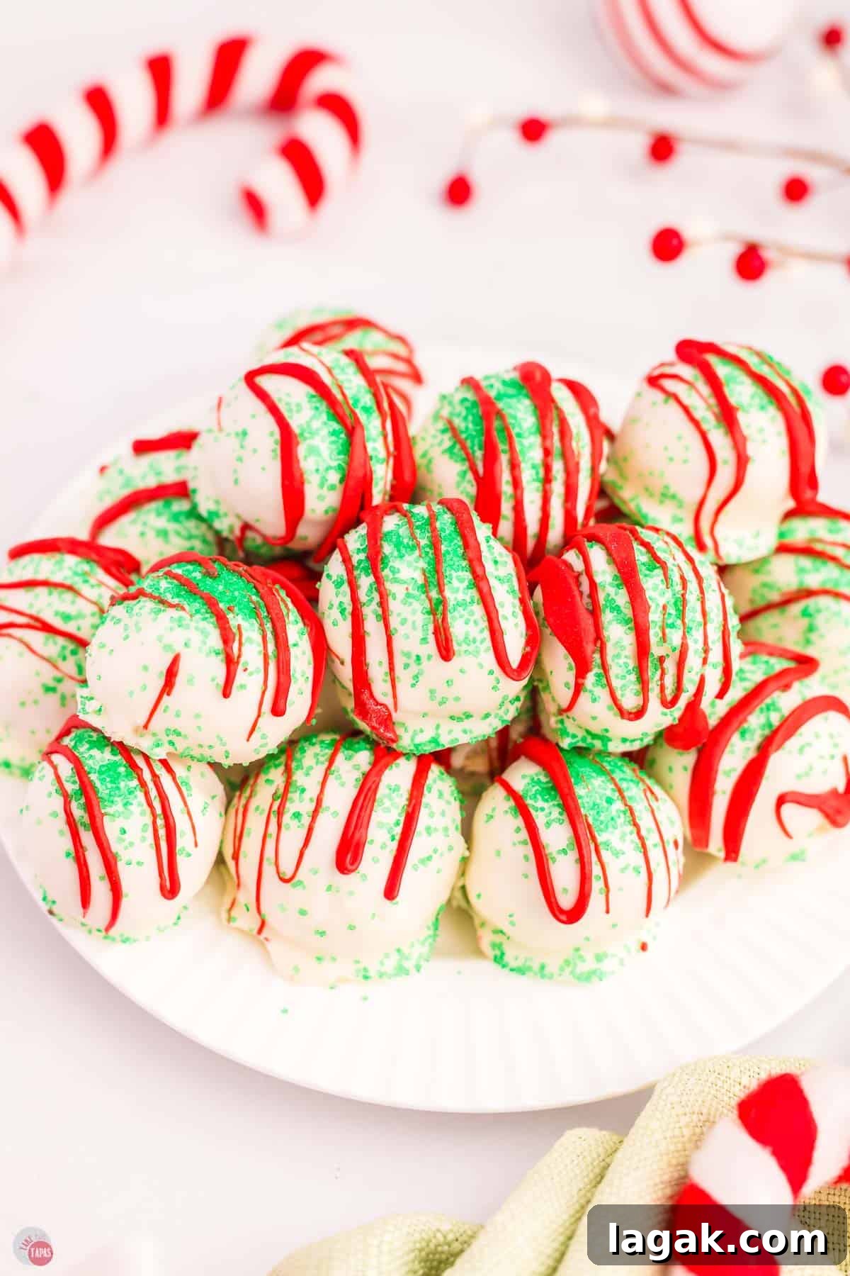 plate with Christmas tree cake balls stacked on top