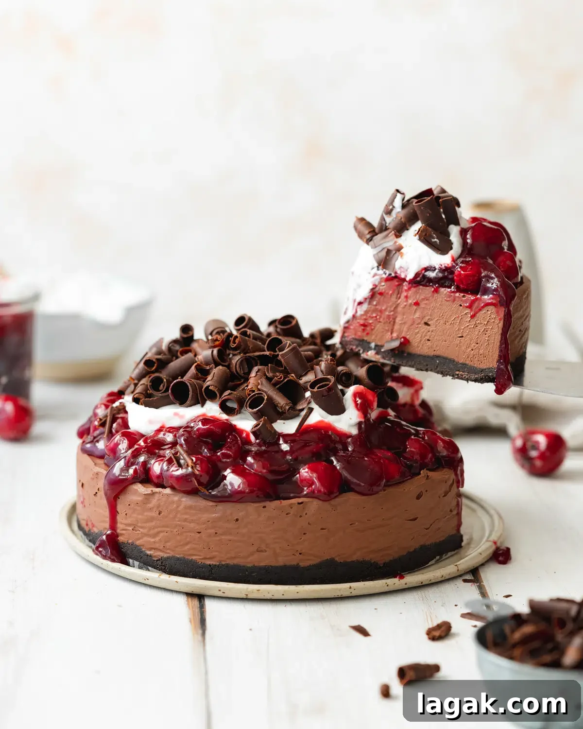 slice of black forest cake lifted from the cheesecake to show the texture
