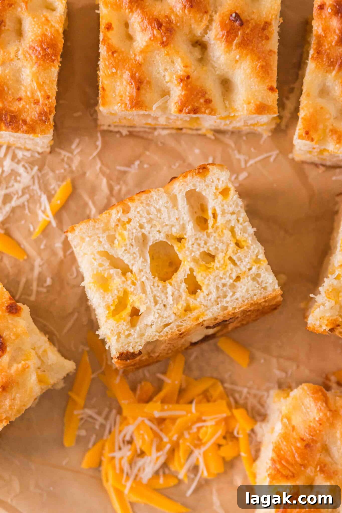 overhead view of pieces of homemade cheese focaccia bread